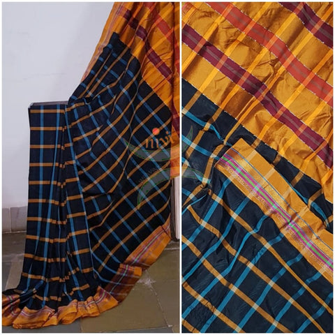 Chequered black kota cotton with woven mustard border and topu teni pallu.