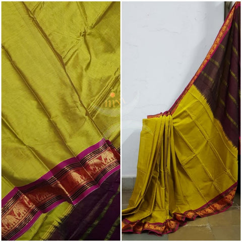 Green mercerised South cotton with contrasting pink woven temple border