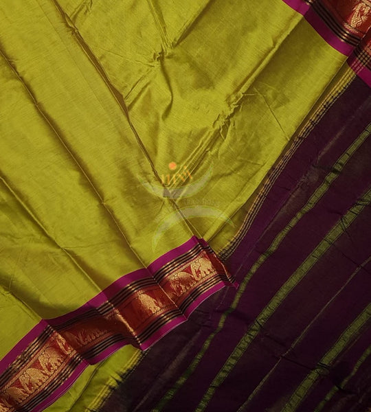 Green mercerised South cotton with contrasting pink woven temple border