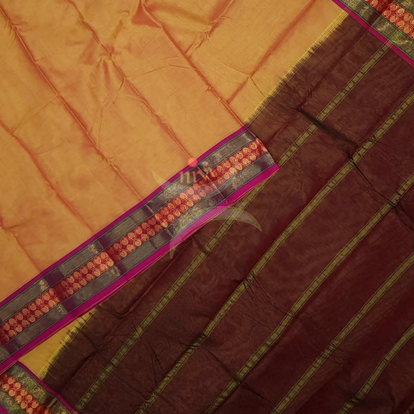Mustard yellow mercerised South cotton with contrasting woven temple border
