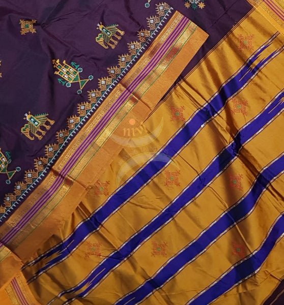 Maroonish Brown ilkal with traditional kasuti machine embroidery.