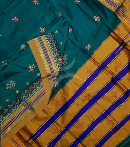 Teal ilkal with traditional kasuti machine embroidery.