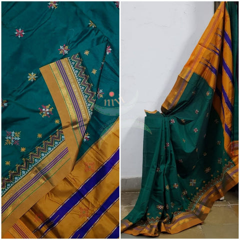 Teal ilkal with traditional kasuti machine embroidery.