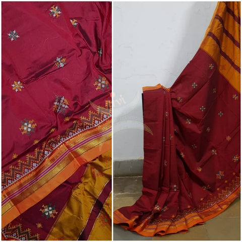 Brick red ilkal with traditional kasuti machine embroidery.