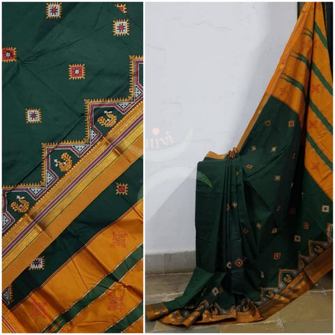 Green ilkal with traditional kasuti machine embroidery.