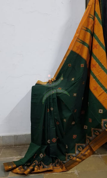 Green ilkal with traditional kasuti machine embroidery.