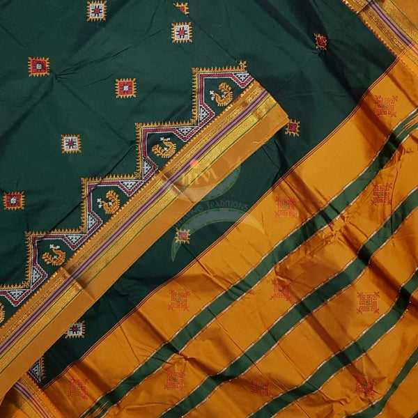 Green ilkal with traditional kasuti machine embroidery.