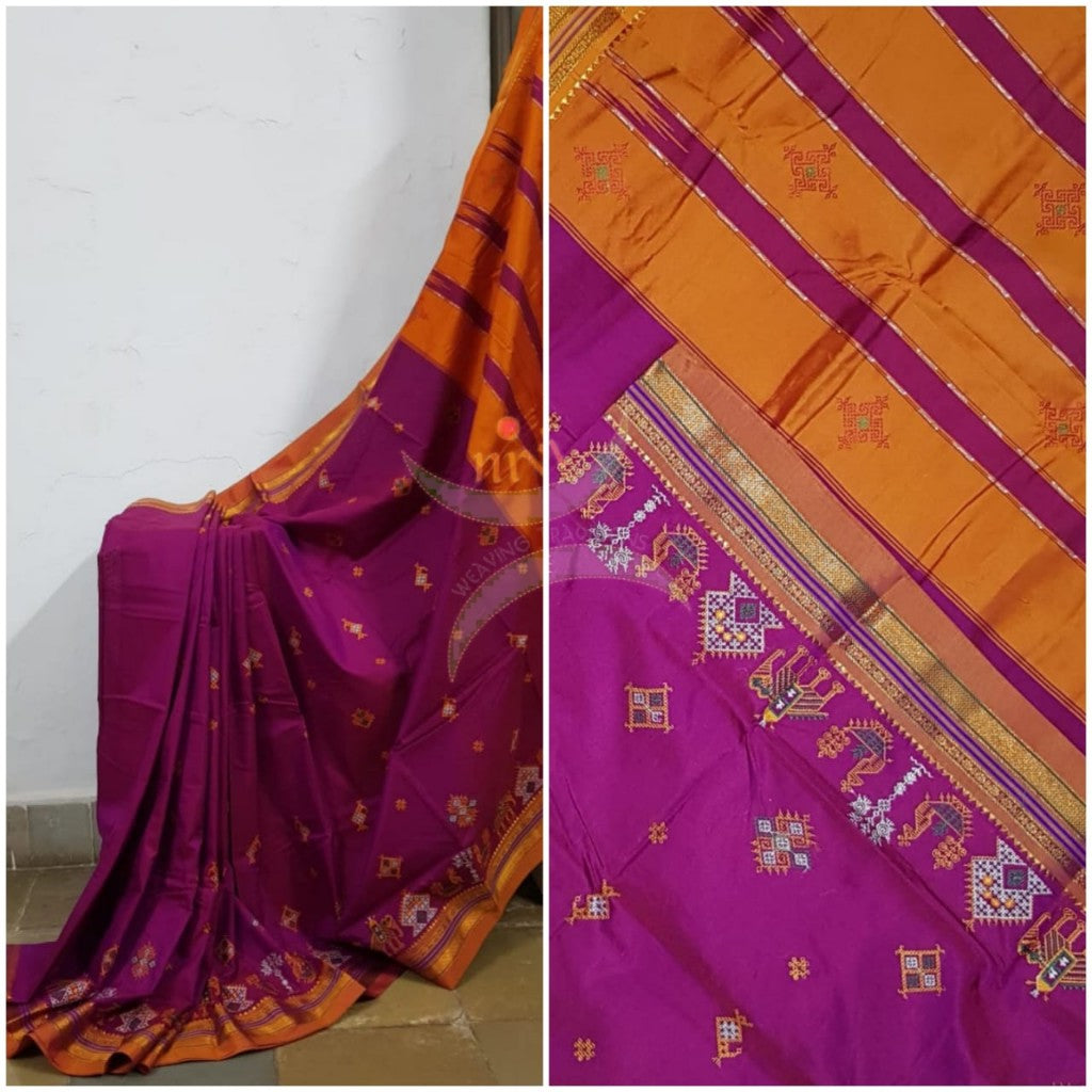 Pink ilkal with traditional kasuti machine embroidery.