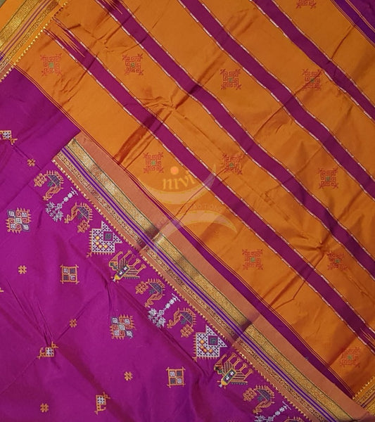 Pink ilkal with traditional kasuti machine embroidery.