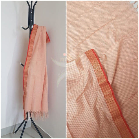 Peach chequared kota cotton dupatta with subtle zari borders.