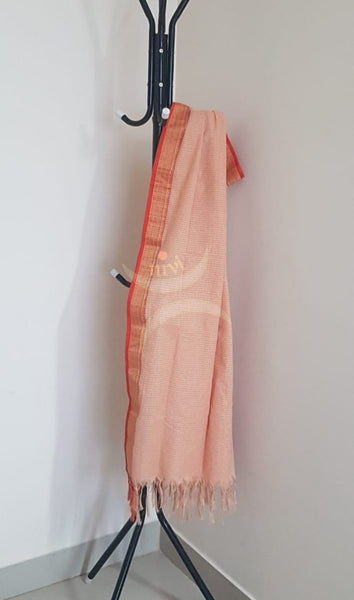 Peach chequared kota cotton dupatta with subtle zari borders.