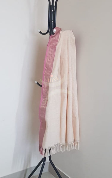 Off white chequared kota cotton dupatta with subtle zari borders.