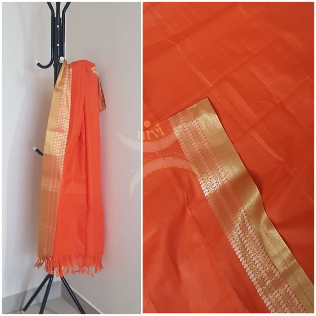 Orange kota cotton dupatta with gold zari borders.
