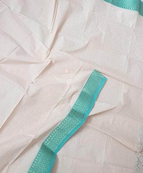 Off white chequared kota cotton dupatta with subtle zari borders.