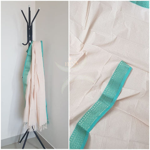 Off white chequared kota cotton dupatta with subtle zari borders.