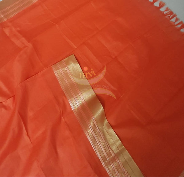 Orange kota cotton dupatta with gold zari borders.