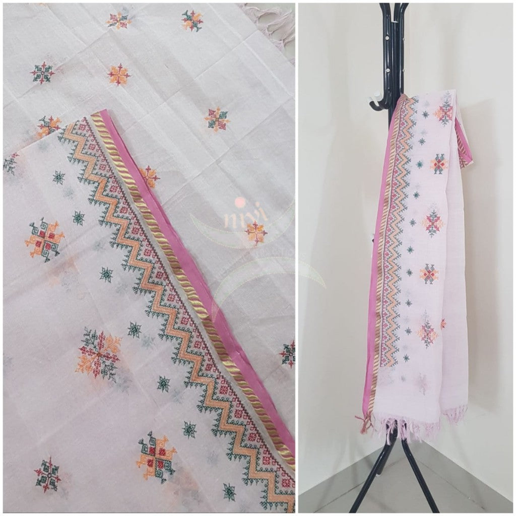 Off white kota cotton dupatta with machine kasuti embroidery.
