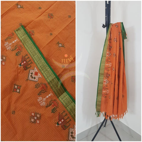 Orange chequared kota cotton dupatta with machine kasuti embroidery.