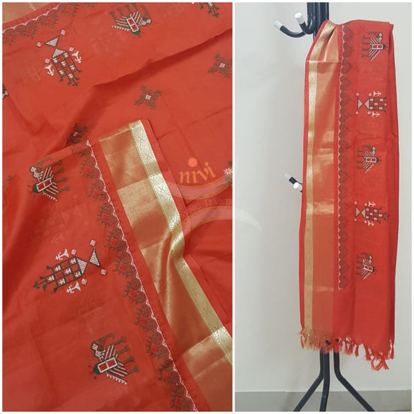 Orange kota cotton dupatta with machine kasuti embroidery.