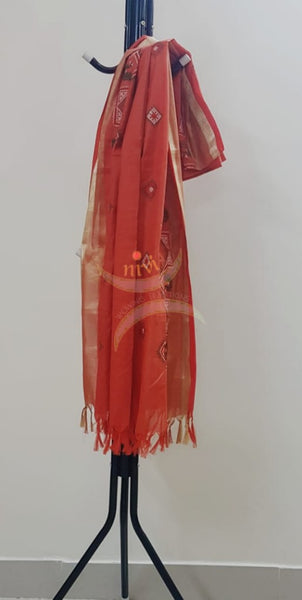 Orange chequared kota cotton dupatta with machine kasuti embroidery.