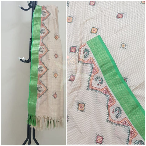 Off white chequared kota cotton dupatta with machine kasuti embroidery.