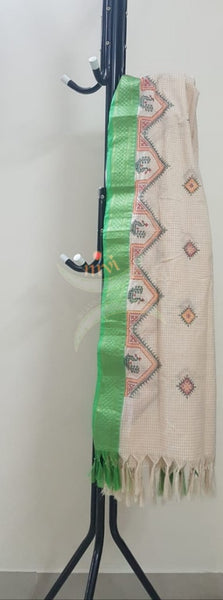 Off white chequared kota cotton dupatta with machine kasuti embroidery.
