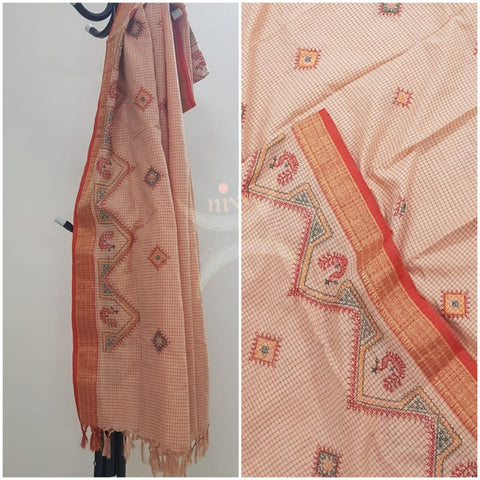 Off white chequared kota cotton dupatta with machine kasuti embroidery.