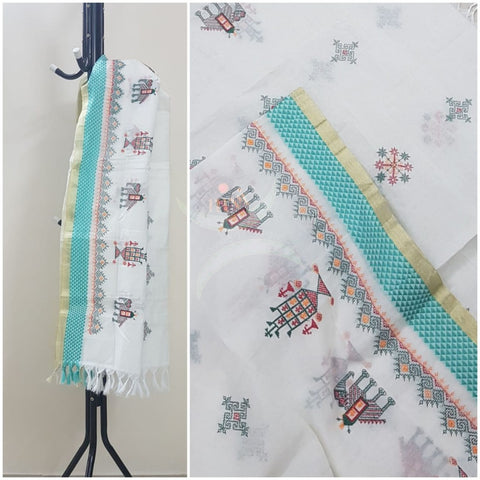 Off white chequared kota cotton dupatta with machine kasuti embroidery.