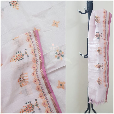 Off white kota cotton dupatta with machine kasuti embroidery.