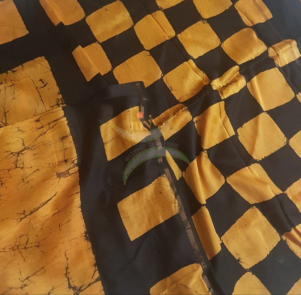 Handloom orange and black chanderi batik saree