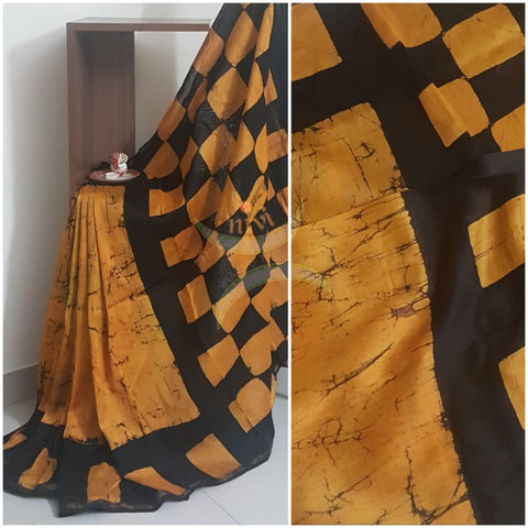 Handloom orange and black chanderi batik saree