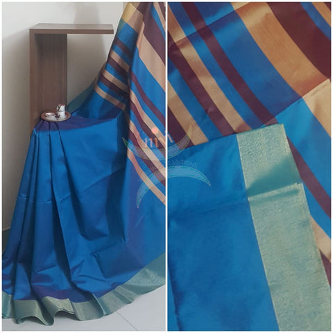 Teal blue art silk saree. Saree comes with contrasting  blouse piece