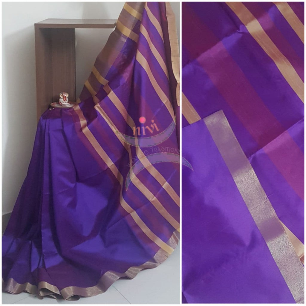 Purple art silk saree. Saree comes with contrasting  blouse piece