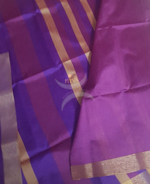 Purple art silk saree. Saree comes with contrasting  blouse piece