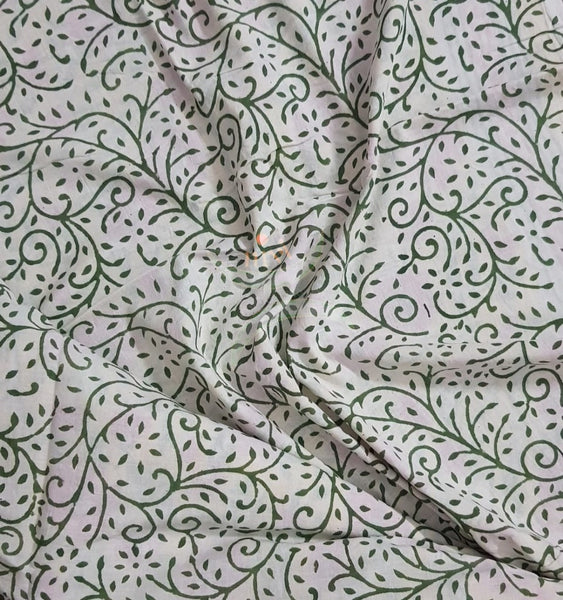 Handloom yellow hand block printed dress material with floral motif and chiffon dupatta.