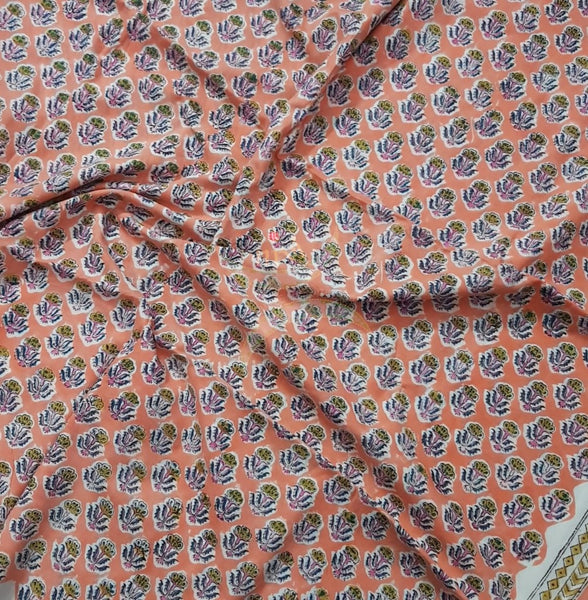 Handloom peach hand block printed dress material with floral motif and chiffon dupatta.