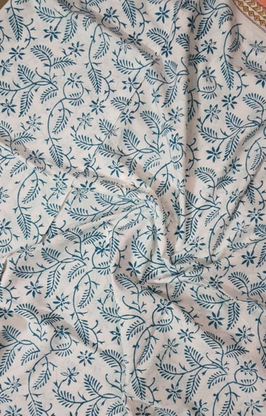 Handloom peach hand block printed dress material with floral motif and chiffon dupatta.