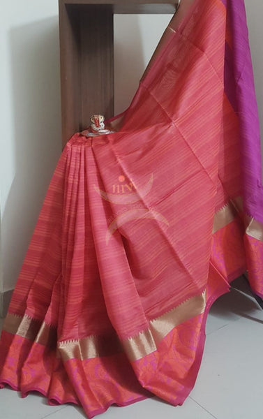 Red orange silk cotton striped saree with thread woven floral motif and antique zari border.saree is with contrast purple pallu and blouse.