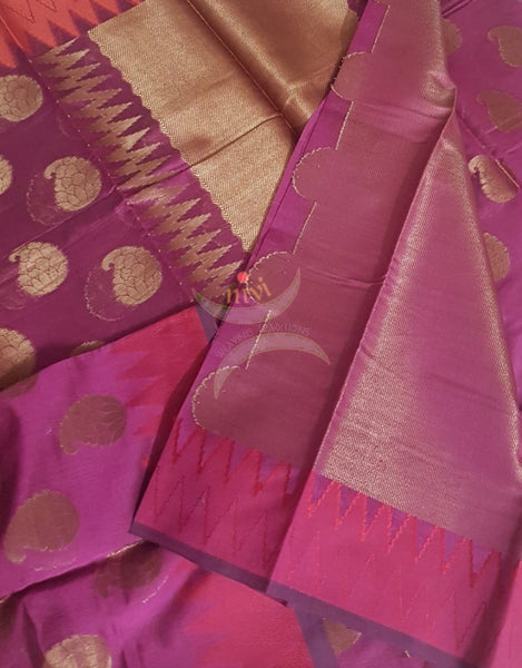Pink cotton blended benaras brocade with ganga jamuna border. Saree comes with antique zari finished pink blouse.