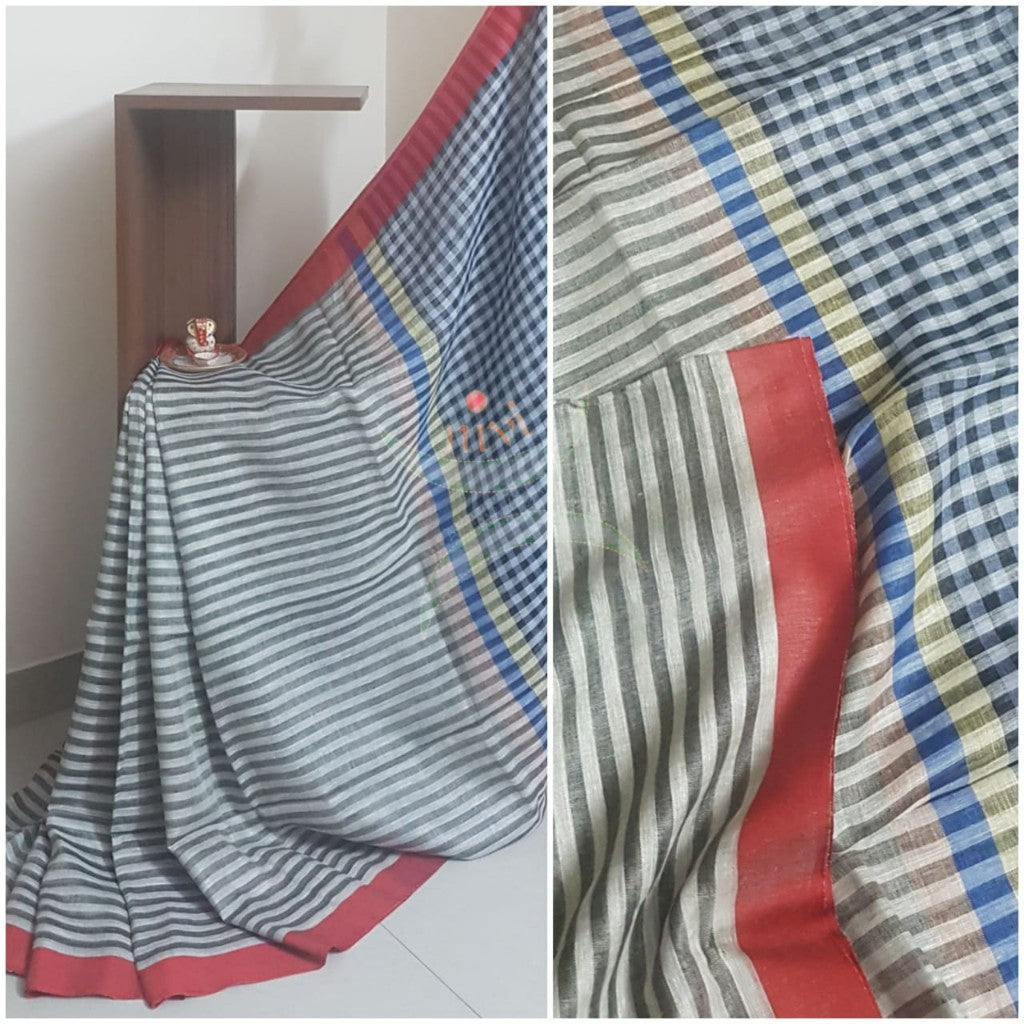 Grey horizontal striped linen saree with contrasting red border
