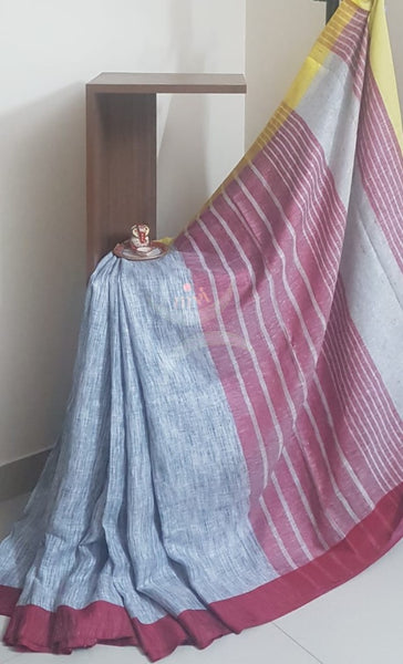 Grey linen saree with contrasting red border