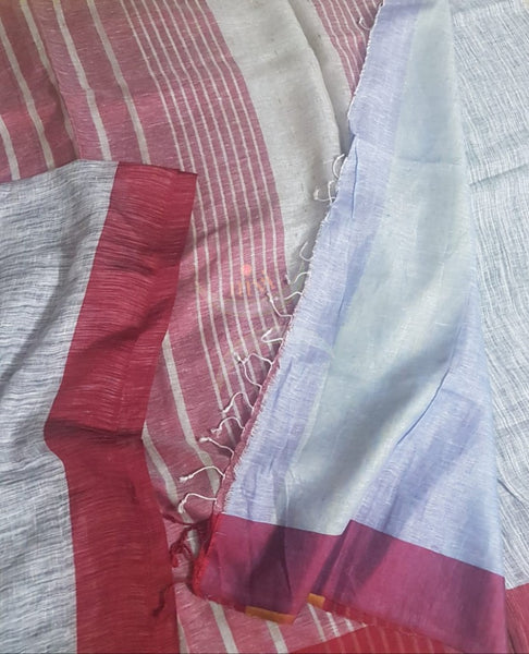 Grey linen saree with contrasting red border