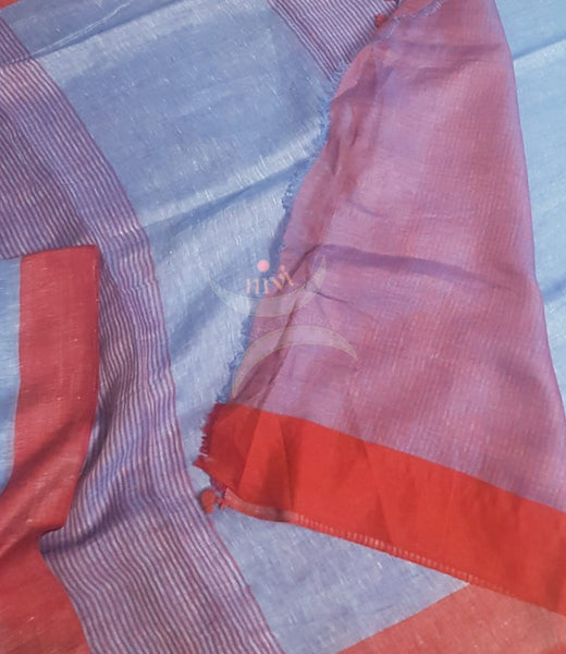 Blue linen saree with contrasting red border