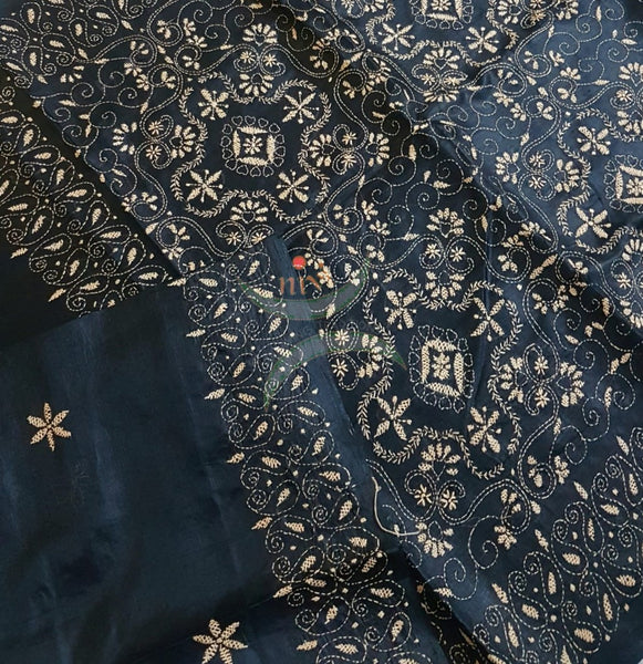 Black Hand embroidered kantha saree on paper silk with beige coloured floral motif.saree comes with running blouse.