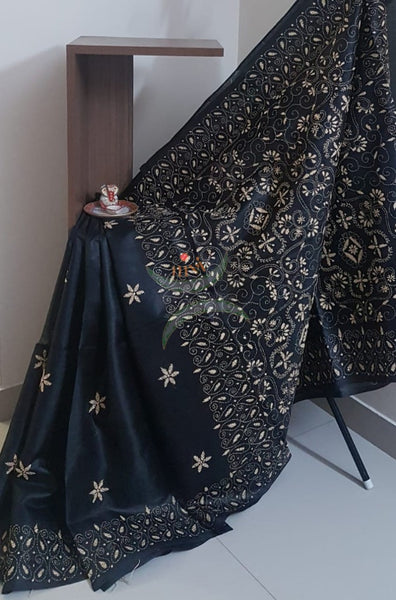 Black Hand embroidered kantha saree on paper silk with beige coloured floral motif.saree comes with running blouse.