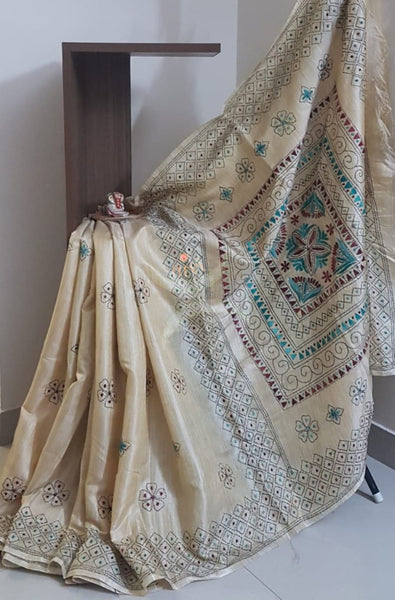 Beige hand embroidered kantha saree on paper silk and running blouse.
