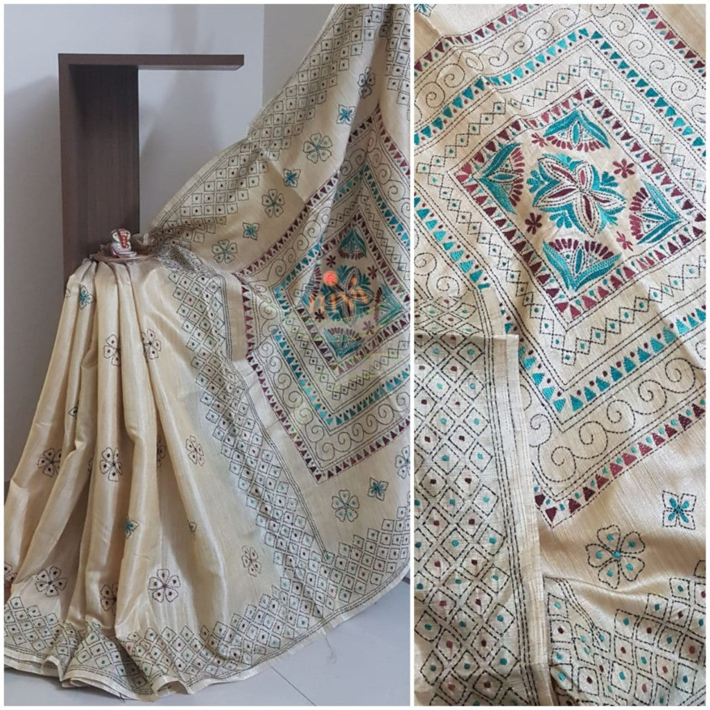 Beige hand embroidered kantha saree on paper silk and running blouse.