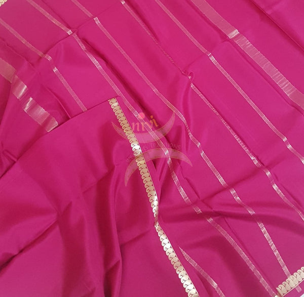 Pink 50 gms pure Silk Crepe with paisley motif fine zari border. Saree comes with pure pink crepe blouse.