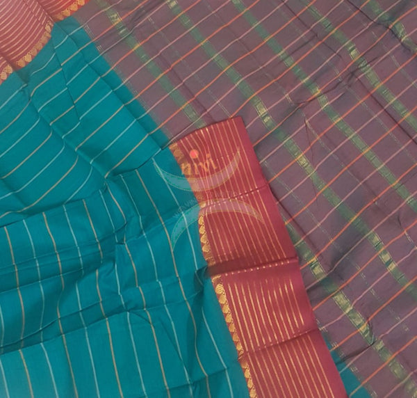 Teal mercerised South cotton with contrasting red woven traditional border