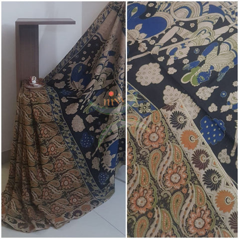 Cotton handloom kalamkari Saree with floral  motifs on body and border,  and human figure motif on pallu. Saree comes with kalamkari printed blouse piece.
